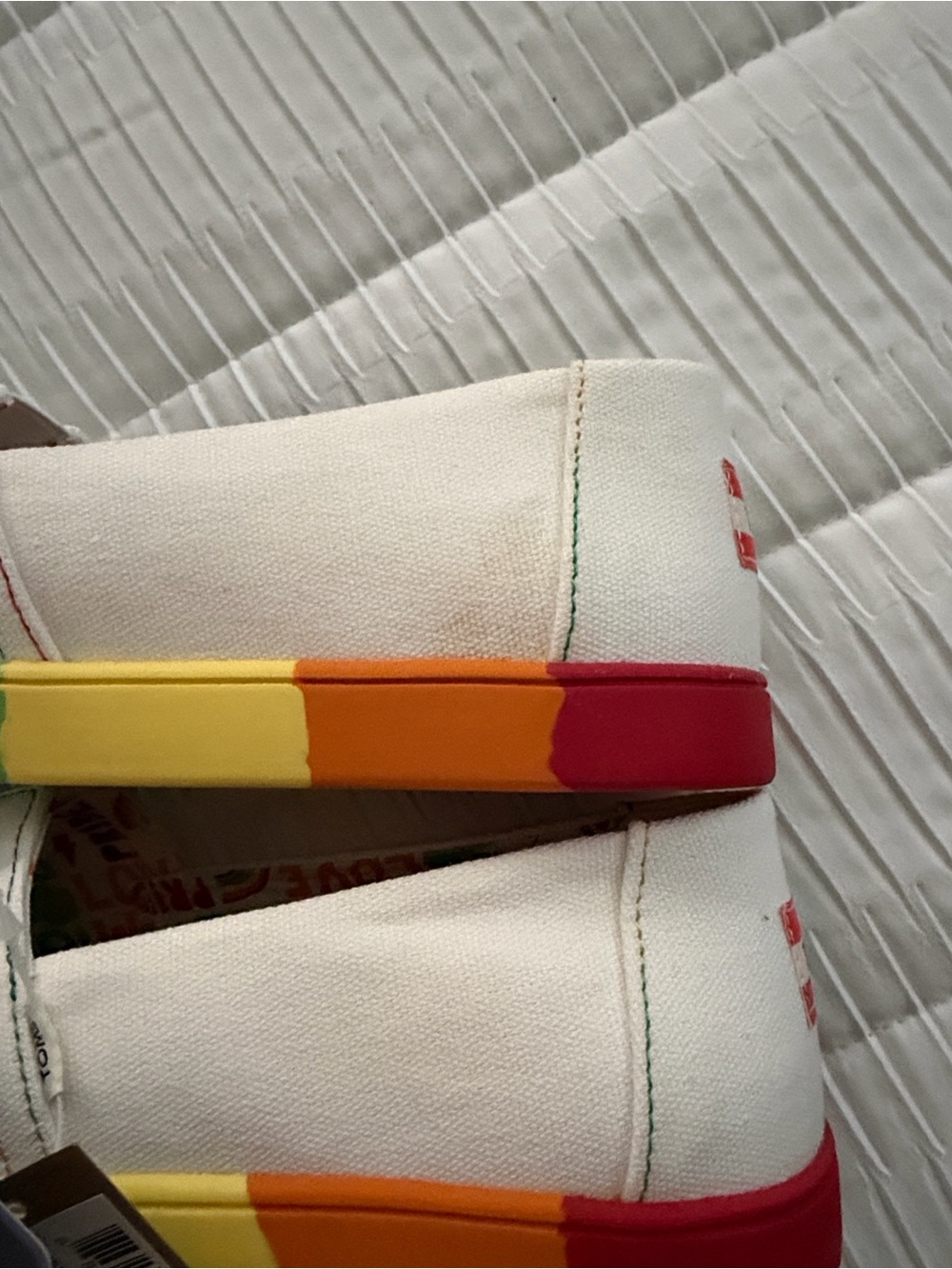 TOMS White Canvas Slip-Ons with Rainbow Pride Insole - Picture 8 of 9